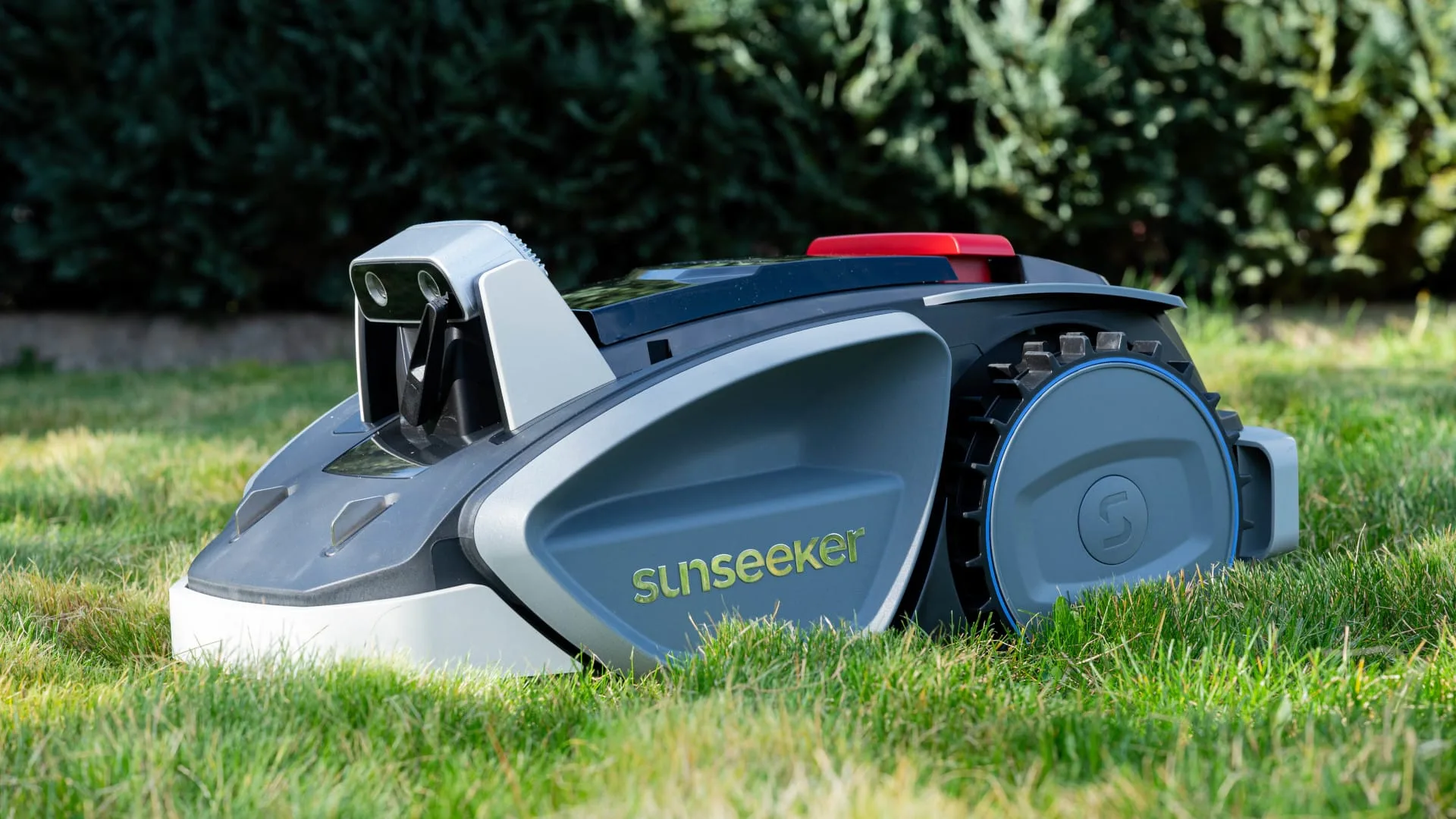 Sunseeker V3 Plus robotic mower on a lawn